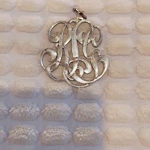 Vintage sterling silver pendant initials (not sure)
